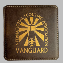 Load image into Gallery viewer, Set of 4 Leather Coasters with logo of Vanguard International Scouting Association
